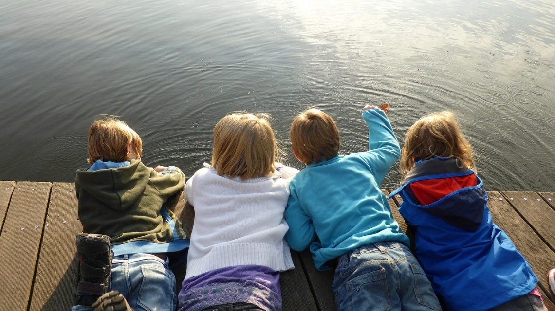 children on dock